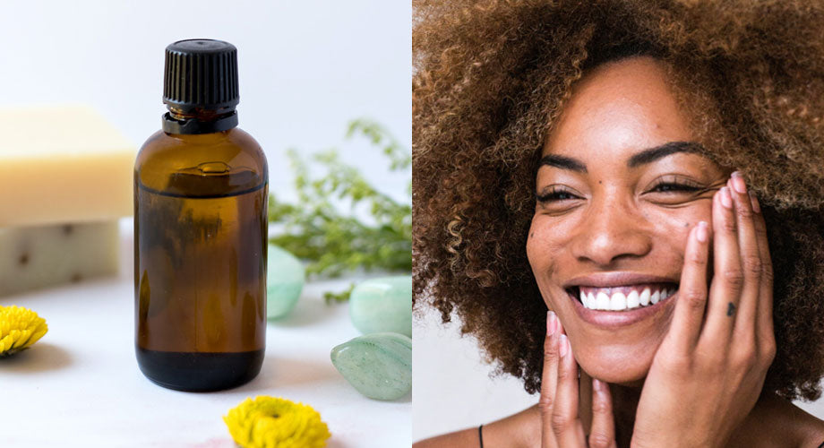 Bottle of jojoba oil and woman smiling
